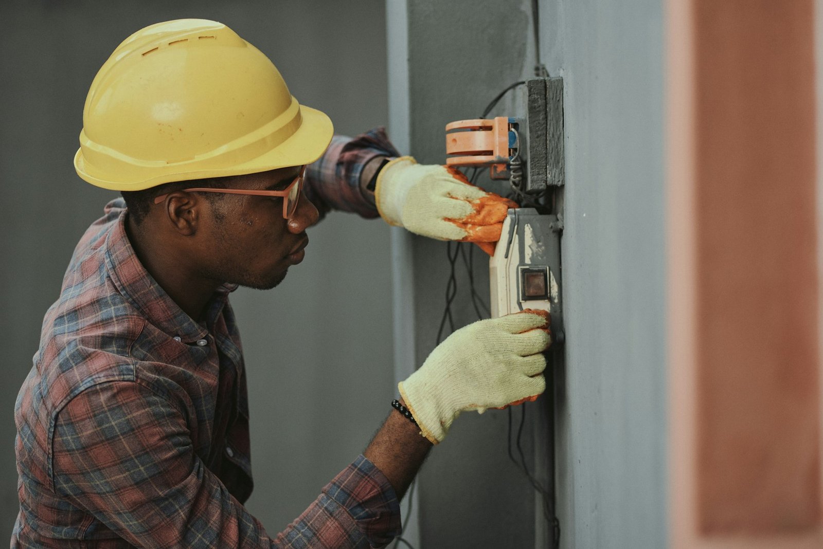 HVAC technician servicing outdoor AC unit